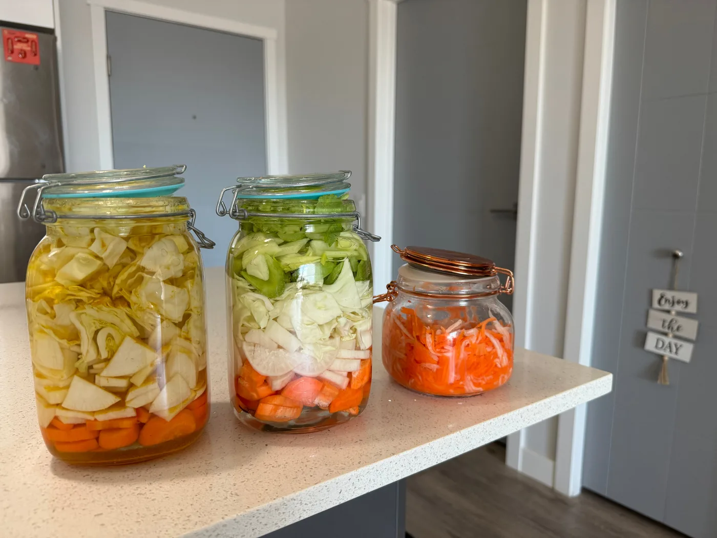 Glass jars arranged for a second fermentation-style process