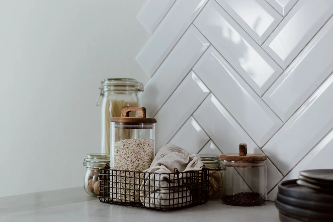 Glass jars arranged on a kitchen counter