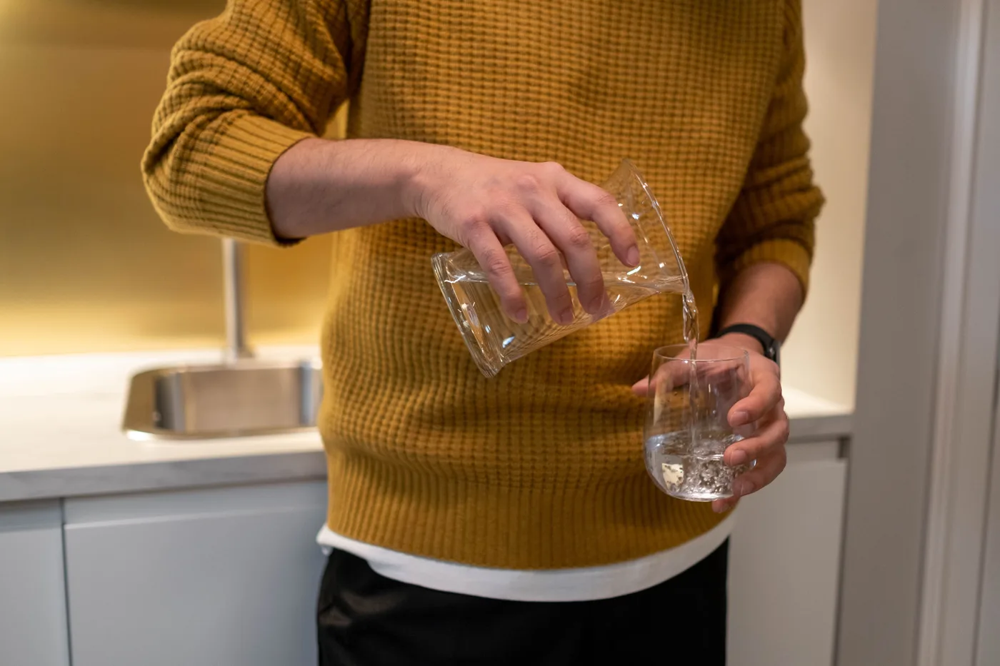 Water being poured into a clear glass